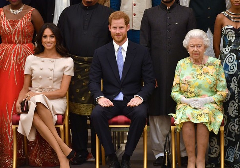 Meghan Markle, príncipe Harry e rainha Elizabeth (Foto: Getty Images) — Foto: Glamour