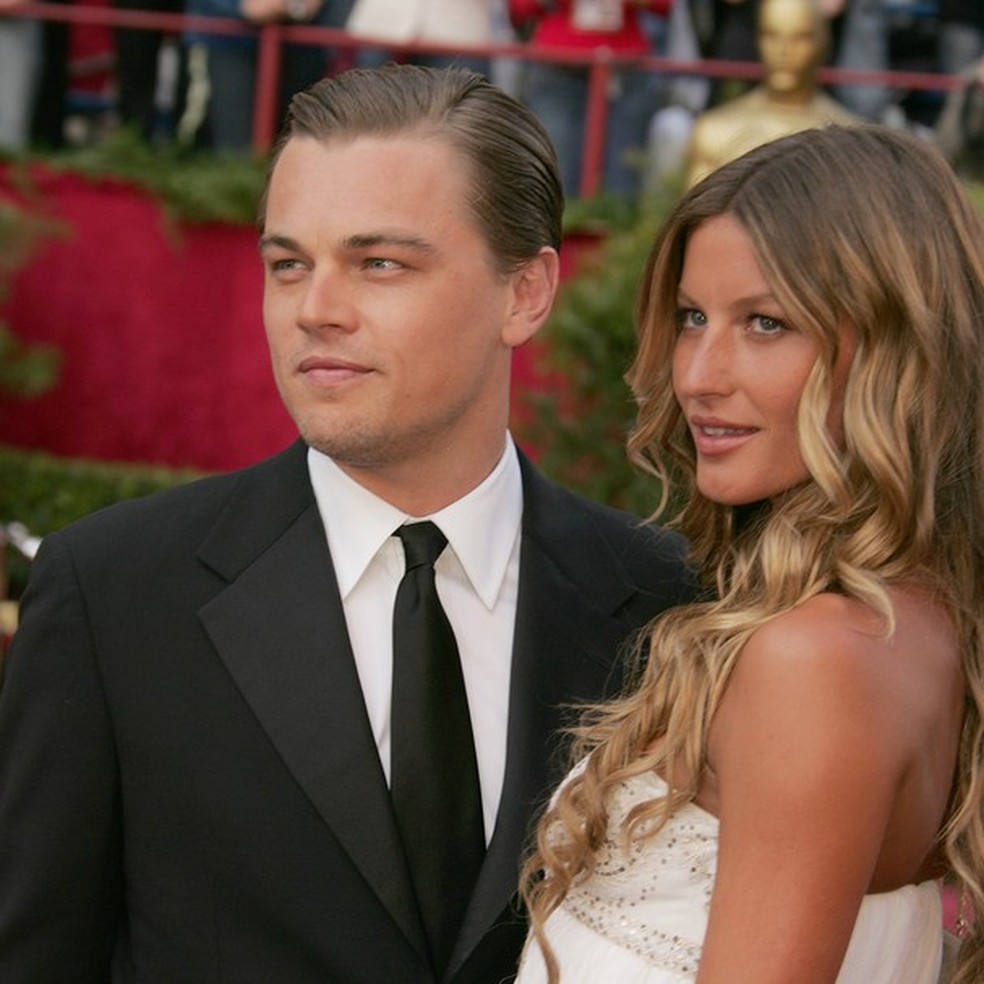 Leonardo DiCaprio, nominee Best Actor in a Leading Role for "The Aviator," and Gisele Bundchen (Photo by Jeffrey Mayer/WireImage) (Foto: WireImage) — Foto: Glamour