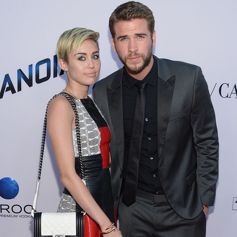 Miley Cyrus e Liam Hemsworth (Foto: Getty Images) — Foto: Glamour