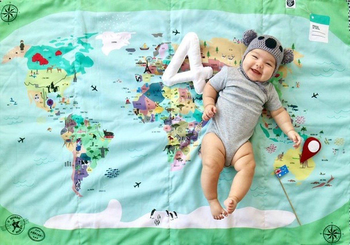 Brasileira faz mesversário da filha com tema de volta ao mundo e as fotos são uma explosão de fofura