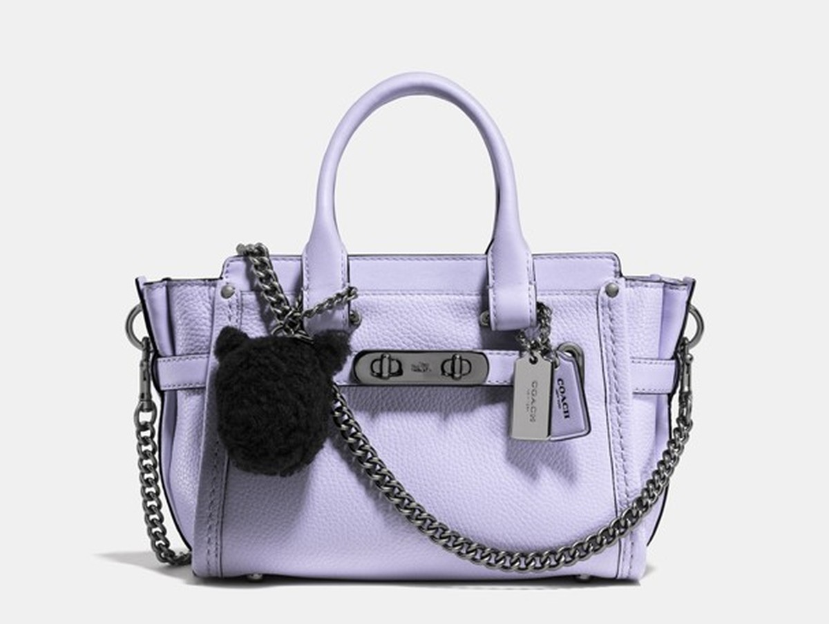 Ariana Grande looks immaculate at Coach handbag launch as she