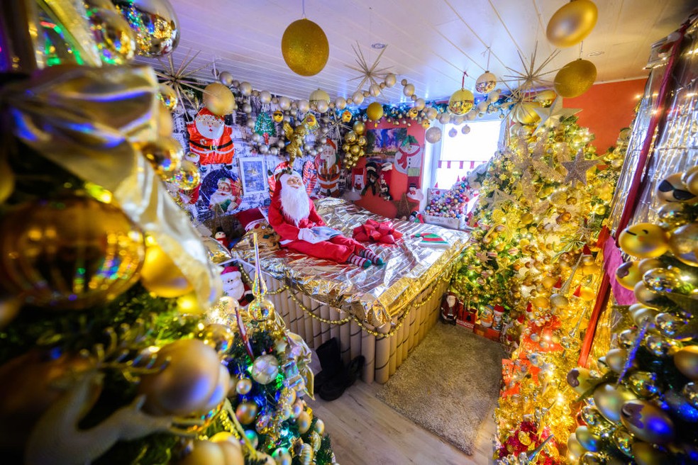 Casal alemão decora casa com 600 árvores e bate recorde mundial — Foto: Getty Images